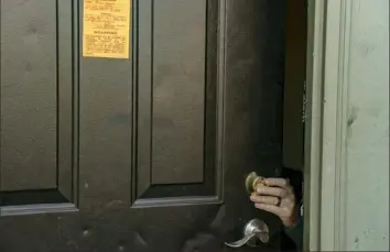  ?? Stephen Zenner/Getty Images ?? An eviction notice is posted and the lock is changed on a residence on March 3 in Galloway, west of Columbus, Ohio. A federal judge ruled Wednesday that the Centers for Disease Control and Prevention oversteppe­d its authority when it instituted a national moratorium on evictions.