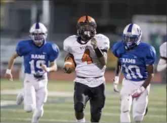  ?? JOHN BLAINE — FOR THE TRENTONIAN ?? Hamilton’s Kevin Boswell picks up a first down against Hightstown during action from this season.