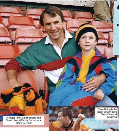  ?? ?? A young Tom Corbett with his dad Clive in the old Family Enclosure at Molineux, 1992