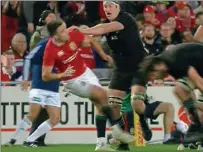  ??  ?? Flashpoint: Brodie Retallick charges into Conor Murray during a bruising First Test