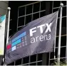  ?? Reuters-Yonhap ?? The logo of FTX is seen on a flag at the entrance of the FTX Arena in Miami, Fla., Saturday.