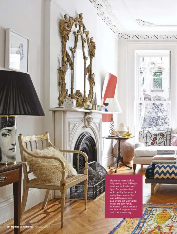  ??  ?? The sitting room, with its lofty ceilings and full-height windows, is flooded with light. The whitewashe­d walls amplify the sense of sunlight and space. The painted Regency chair and ornate gilt overmantel mirror are both family heirlooms. Colour comes in the form of bright cushions and a Moroccan rug.