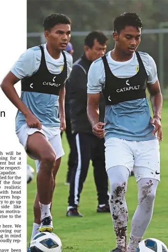  ?? — FAM ?? Experience on their side: national Under-23 stalwarts azam azmi Murad (left) with Mukhairi ajmal Mahadi at a training session. They were also part of the senior team for the World Cup 2026-asian Cup 2027 second round qualifiers against Oman recently.