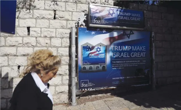  ?? (Reuters) ?? A POSTER in Jerusalem supporting Donald Trump.