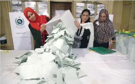  ?? — Reuters ?? An opposition alliance led by the party of former prime minister Nawaz Sharif won more seats in the national parliament than Imran Khan and his allies in Sunday’s polls, elections authoritie­s said.