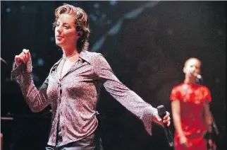  ?? THE ASSOCIATED PRESS/FILES ?? Canadian singer-songwriter Sarah McLachlan, seen at a 1997 Lilith Fair concert in Mountain View, Calif., says her album Surfacing, which turns 20 this year, “has great legs.”