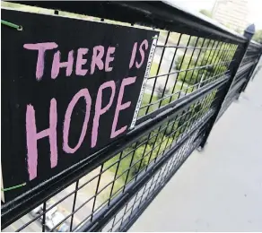  ?? DAVID BLOOM/FILES ?? A sign on the High Level Bridge in 2014 delivers a message Edmonton hopes to share with a suicide prevention strategy.
