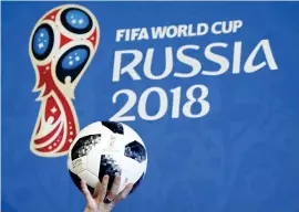  ??  ?? The official match ball is displayed for the 2018 FIFA World Cup Russia. Reuters