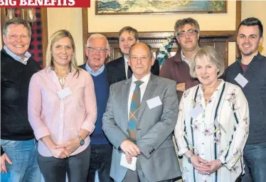  ??  ?? Transport boost Speakers, KDVCS volunteers and guests at launch of scheme (All pictures by Ron Allner) Cash boost MP Stephen Kerr (left) gives a donation to Don Fraser of KDVCS