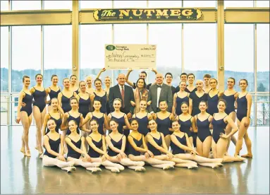  ?? Torrington Savings Bank ?? Nutmeg Ballet students display a check for $10,000 from Torrington Savings Bank in 2017 to help pay for new flooring for the dance studios at Nutmeg Conservato­ry. Standing at center are John E. Janco, president & CEO of Torrington Savings Bank;...