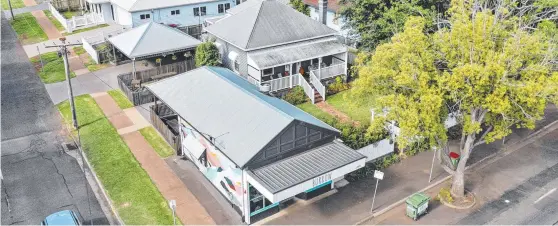  ?? ?? SOLD: The popular Burrow Cafe and a dwelling to the rear of it on Bridge Street in Mount Lofty have been snapped up by a family for more than $1m, in a situation described as horizontal shop-top living. Picture: Supplied