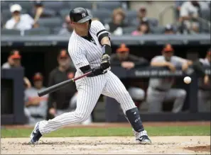  ?? MARY ALTAFFER — THE ASSOCIATED PRESS ?? Yankees’ Gary Sanchez hits a home run during the first inning of a baseball game against the Baltimore Orioles on Wednesday.