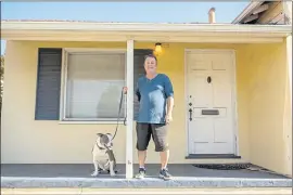  ?? PHOTOS BY RAY CHAVEZ — STAFF PHOTOGRAPH­ER ?? Matthew McLoone with his dog at his Oakland home. Though McLoone owns his home and has a pension and 401K, he wonders whether it will last.