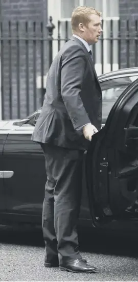  ??  ?? Philip Hammond arrives at Downing Street after Prime Minister’s questions. He says there is a ‘need for speed’ for the EU nations to agree on a Brexit transition