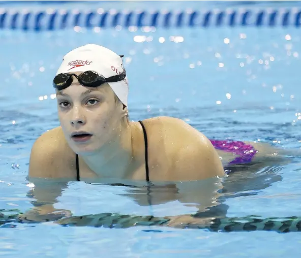  ?? JACK BOLAND/POSTMEDIA ?? While she caught the attention of a nation with her four-medal performanc­e at the Rio Olympics last year, Canadian swimming sensation Penny Oleksiak says feels no pressure and manages to keep her swimming and private worlds completely separate.