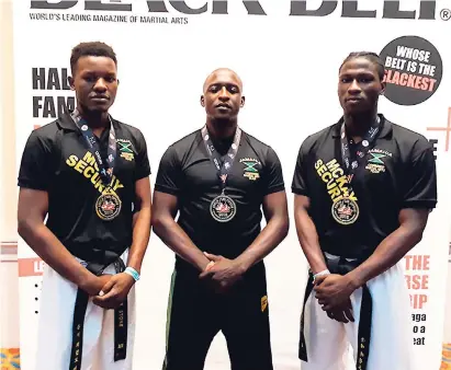  ??  ?? Jamaica’s big three (from left) Richard Stone, Kenneth Edwards and Akino Lindsay, accounted for four of the island’s six gold medals won in continuous sparring at the Internatio­nal Sports Karate Associatio­n’s United States Open yesterday