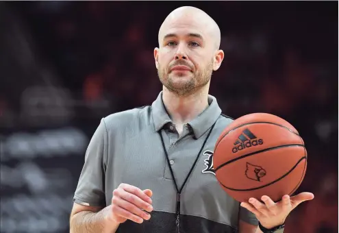  ?? Timothy D. Easley / Associated Press ?? UConn assistant coach Luke Murray, shown here with Louisville, says he has always had a passion for recruiting.