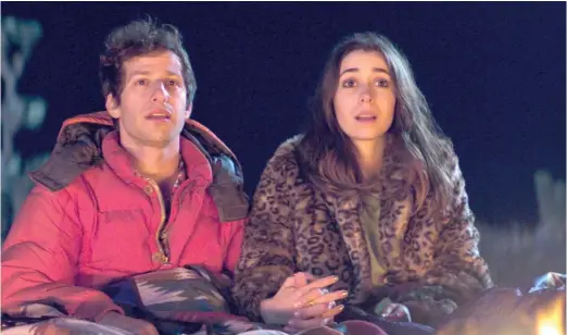  ?? HULU ?? Stuck in a loop repeating the same day over and over, Nyles (Andy Samberg) accidental­ly dooms Sarah (Cristin Milioti) to the same fate in “Palm Springs.”