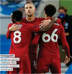  ?? PICTURE: REUTERS ?? Unstoppabl­e: Henderson (centre) celebrates after scoring Liverpool’s second goal