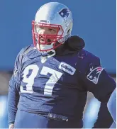  ?? STAFF FILE PHOTO BY JOHN WILCOX ?? BACK IN LINE: Newly re-signed Alan Branch and the Patriots will open the 2017 preseason against the Jaguars.