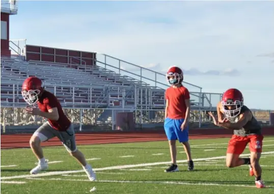  ??  ?? Estancia High School football players were out on the field this week wearing helmets for the first time in more than a year. Photo by Ger Demarest.