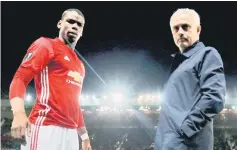  ??  ?? File photo shows Mourinho with Paul Pogba before the match. — Reuters photo