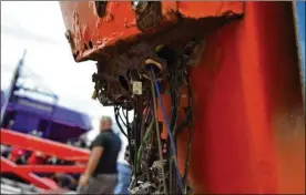  ?? OHIO HIGHWAY PATROL ?? This severely rusted electrical box is part of the critical safety restraint system that locked and unlocked the over-the-shoulder safety bars on the gondola that broke off from the Fire Ball ride at the Ohio State Fair on July 26, killing a rider....