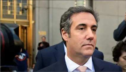  ?? AP PhoTo/SeTh WenIg ?? In this April 26 file photo, Michael Cohen leaves federal court in New york.