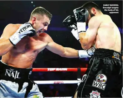  ??  ?? EARLY SUCCESS: Gvozdyk targets the body of his opponent