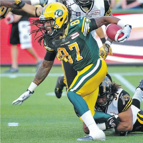  ?? ED KAISER /EDMONTON JOURNAL ?? Patrick Robertson of the Edmonton Eskimos was second in the league with 269 return yards before injuring his left knee while trying to change direction during a season-high 62-yard kickoff return in Friday’s 28-24 victory over the Tiger-Cats.