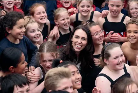  ?? CHRIS SKELTON/ STUFF ?? A tearful Charlotte Price is comforted by Prime Minister Jacinda Ardern at West Spreydon School in Christchur­ch yesterday.