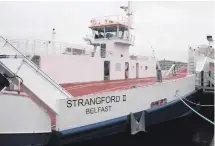  ??  ?? The new £6m replacemen­t Strangford ferry remains tied up in Co Down because problems with the ramps mean vehicles are unable to drive off it at high tide