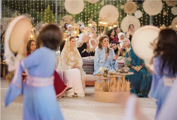  ?? Reuters ?? Queen Rania of Jordan hosts a pre-wedding celebratio­n for her future daughter-in-law Rajwa Al Saif at the Royal Hashemite Court in Amman