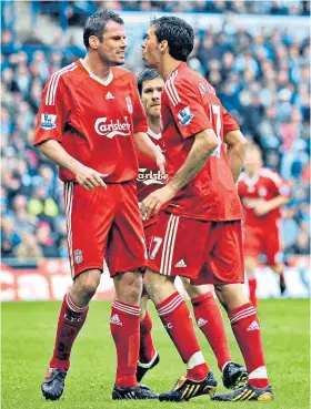  ??  ?? Pitch battle: Jamie Carragher and Alvaro Arbeloa fell out in 2009 (above), just as Anwar El Ghazi and Tyrone Mings did on Monday (left)