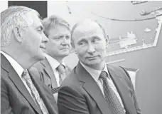  ?? EUROPEAN PRESSPHOTO AGENCY ?? Russian President Vladimir Putin and Rex Tillerson in 2012.