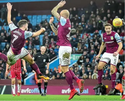  ?? REX/SHUTTERSTO­CK ?? Acrobatic: Robert Snodgrass (left) gets airborne to hook in the first of his two goals