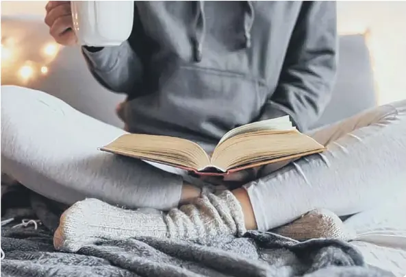  ??  ?? Reading has brought comfort to many during lockdown (photo: Getty Images)