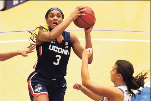  ?? Noah K. Murray / Associated Press ?? UConn’s Aaliyah Edwards (3) drives to the basket against Seton Hall on Tuesday in South Orange, N.J.