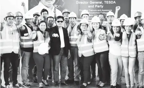  ?? TESDA ?? IN DEMAND. Some of the 33 graduates who completed their Training Methodolog­y and acquired their National Certificat­es on carpentry and masonry on Saturday, July 14, during the graduation ceremony held at Aces Polytechni­c College, Panabo City, Davao del Norte, with Tesda Director General, Secretary Guiling “Gene” Mamondiong.