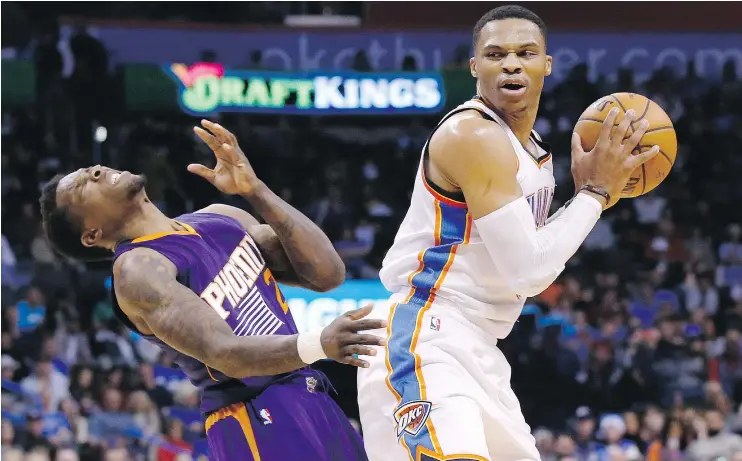  ?? — THE ASSOCIATED PRESS ?? Guard Eric Bledsoe, left, and the Phoenix Suns had no answer for Oklahoma City Thunder star Russell Westbrook in a 114-101 Thunder win Saturday.