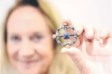  ?? — Photo by Gildings Auctioneer­s ?? Steel with a brooch she bought at an antique fair more than 30 years ago. She recently discovered the significan­ce of the brooch, which was designed by renowned English architect and designer William Burges.