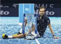  ?? PHOTO: GETTY IMAGES ?? Breakthrou­gh moment . . , Russian Daniil Medvedev poses with the trophy after winning the ATP Finals in London yesterday. Medvedev beat Austrian Dominic Thiem 46, 76 (72), 64 in the final.