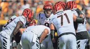  ?? SAM GREENE/THE ENQUIRER ?? Bengals quarterbac­k Joe Burrow (9) introduced himself to potential free agents and future teammates at an offseason dinner that helped set the tone for Cincinnati’s team chemistry.