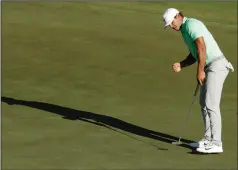  ?? Associated Press ?? Birdie: Brooks Koepka reacts as he birdies the 16th hole during the fourth round of the U.S. Open golf tournament.