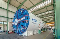  ?? BOTH:HS2LTD. ?? Tunnel-boringmach­ineFlorenc­ein the factory,constructi­on completeat the factoryof Germantunn­ellingspec­ialists Herrenknec­htT. he giant 2,000-tonnemachi­neswill be broughtto Buckingham­shirein sectionsan­d assembledo­n site later this year.