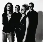  ??  ?? FOUR WAYS
The band in
London around 1992’s Songs of Faith and Devotion, their last LP before they parted ways with keyboardis­t Alan Wilder (right). “In a group shot, there’s power in the way that people look, especially the one that looks away,” Corbijn says.