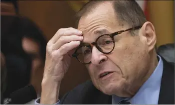  ?? AP PHOTO/J. SCOTT APPLEWHITE ?? House Judiciary Committee Chairman Jerrold Nadler, D-N.Y., leads his panel to approve guidelines for impeachmen­t investigat­ion hearings on President Donald Trump, on Capitol Hill in Washington, on Thursday.