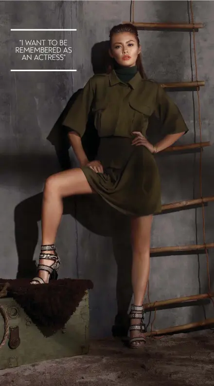  ??  ?? COVERT AFFAIR
Cover up in varying shades of military green for a polished take on militia dressing
Green cropped button-down and skirt both by RICA RICO and snakeskin heels from JIMMY CHOO