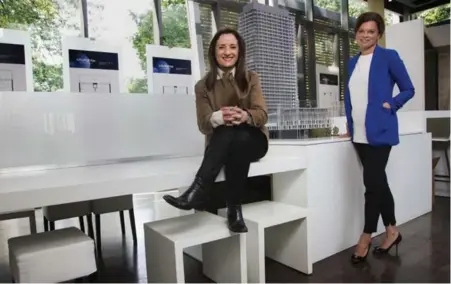  ?? ANDREW FRANCIS WALLACE/TORONTO STAR ?? Designer Elaine Cecconi, left, with Mariana Durcikova of the Pemberton Group, worked to turn City Lights’ condo expanses into shared spaces.