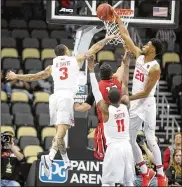  ?? DAVID JABLONSKI / STAFF ?? Dayton has two players 6-8 or taller, including Xeyrius Williams (right). But four Wichita State players who are 6-8 or taller average double-figure minutes.